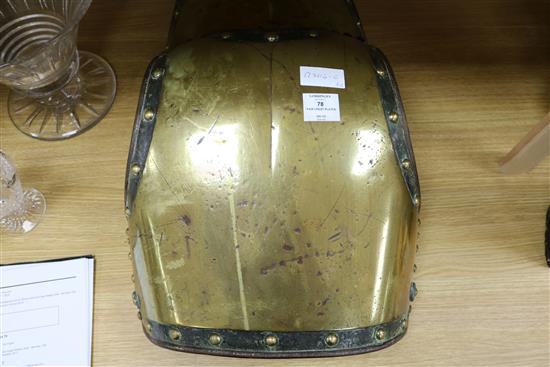 A pair of Victorian brass and iron armour chest plates